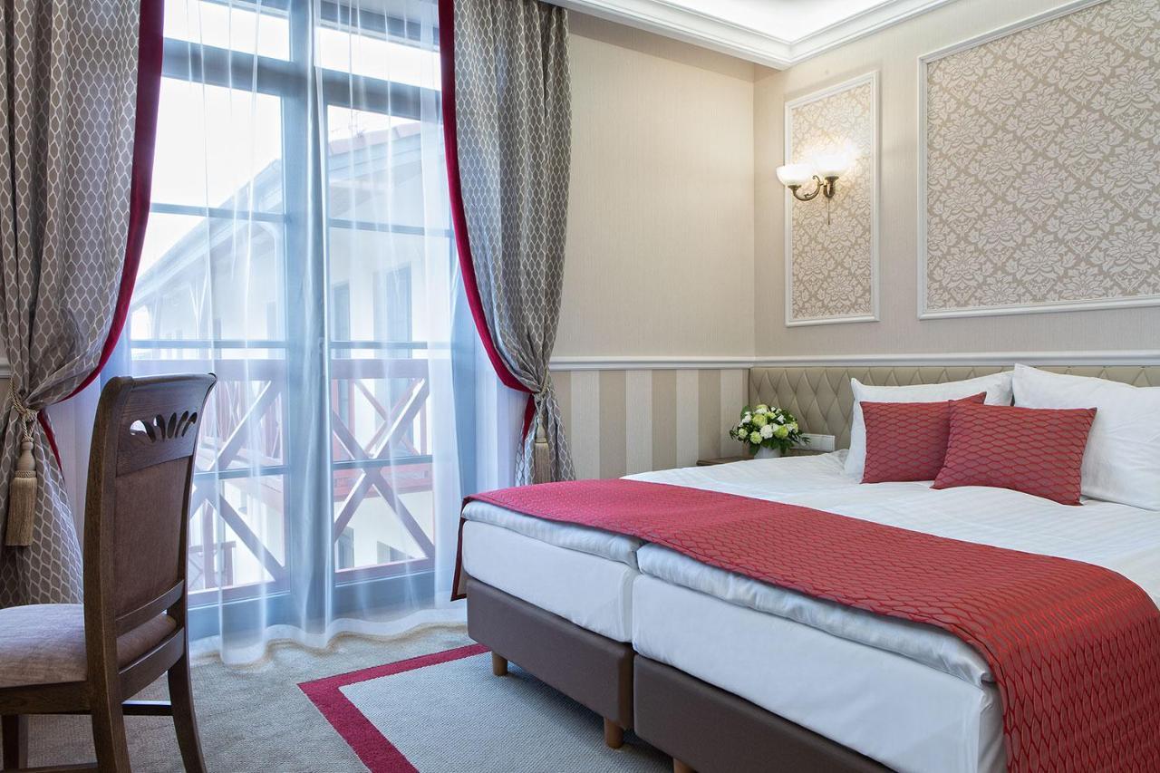 Boutique Odyseja & Spa Ciechocinek Exteriör bild A room at the hotel