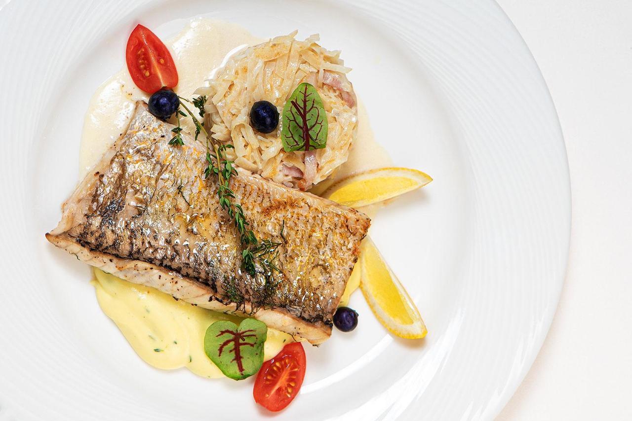 Boutique Odyseja & Spa Ciechocinek Exteriör bild A prepared dish of Arctic char